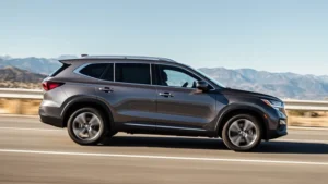 Modern seven-passenger SUV driving on a smooth highway with mountains in the distant background, clear daylight, professional photography style, showing the vehicle's side profile